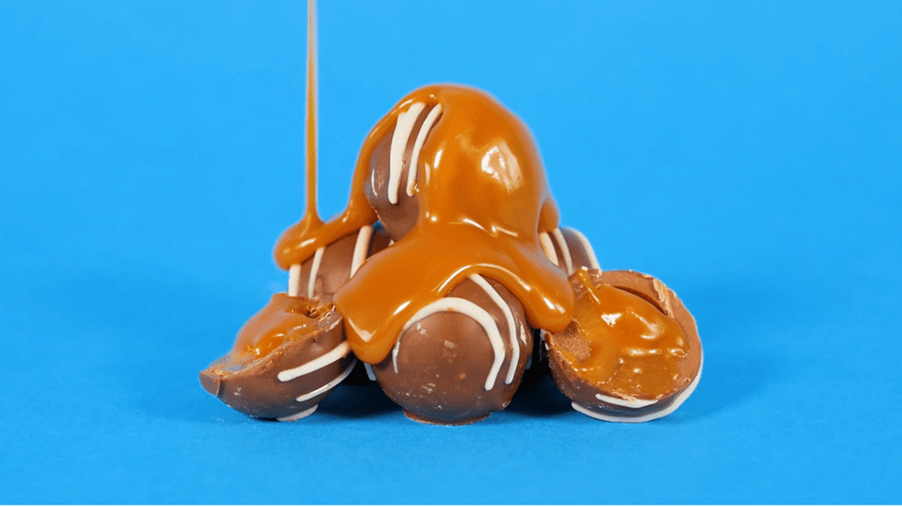 salted caramel pouring over american idol chocolate truffles 